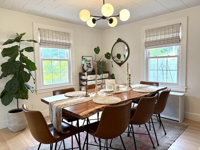 12 Wellington St, Buckland, MA 01370 - dining area featuring wood finished floors, ornamental molding, a chandelier, and baseboards