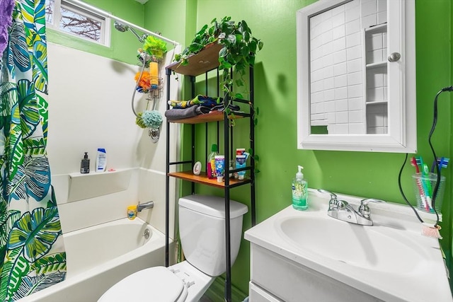 full bathroom with vanity, shower / bath combo, and toilet