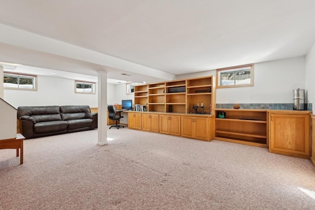 living area with light colored carpet