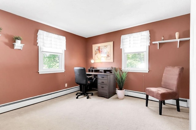 office area with plenty of natural light, carpet floors, a baseboard heating unit, and baseboards
