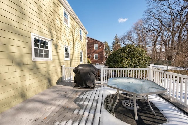 wooden deck with area for grilling