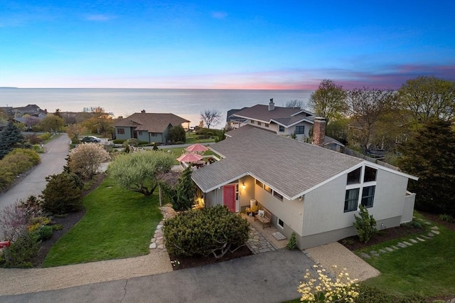 view from above of property with a large body of water