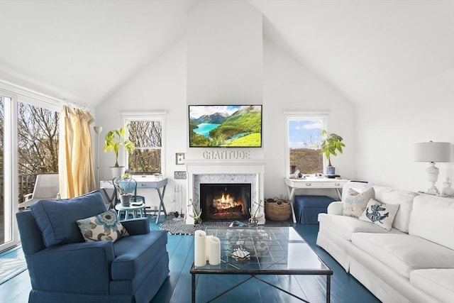 13 Parson Ln, Nantucket, MA 02554 - living room featuring high vaulted ceiling, a fireplace with flush hearth, and a healthy amount of sunlight