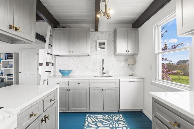 13 Parson Ln, Nantucket, MA 02554 - kitchen with beam ceiling, a sink, dishwasher, tasteful backsplash, and wood ceiling