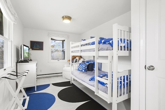 13 Parson Ln, Nantucket, MA 02554 - bedroom with tile patterned floors and a baseboard radiator