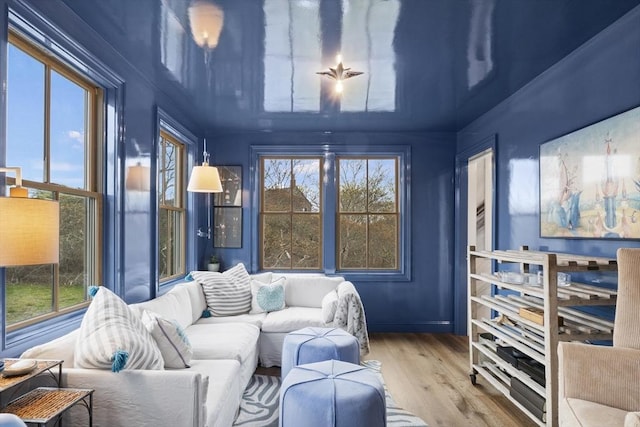 13 Parson Ln, Nantucket, MA 02554 - living area featuring plenty of natural light and wood finished floors