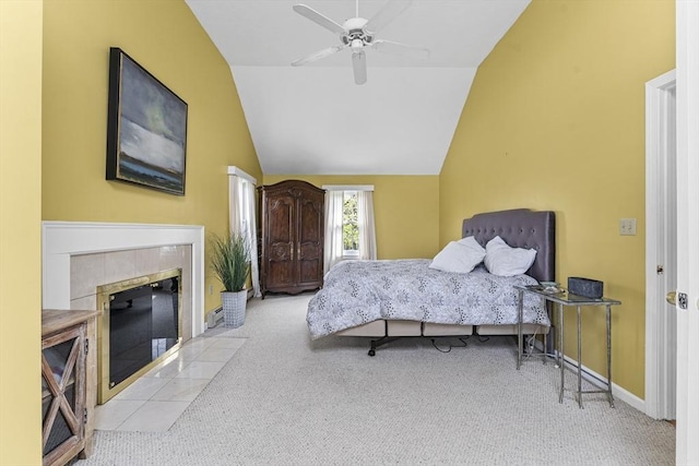 31 Wight St, Waltham, MA 02452 - bedroom with a fireplace, baseboards, baseboard heating, carpet flooring, and vaulted ceiling