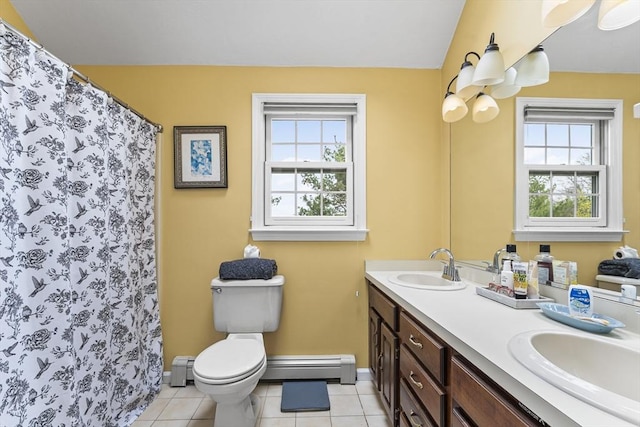 31 Wight St, Waltham, MA 02452 - bathroom featuring plenty of natural light, a sink, and baseboard heating