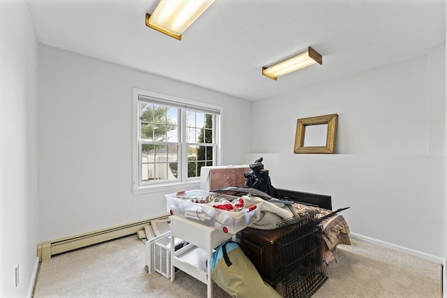 31 Wight St, Waltham, MA 02452 - miscellaneous room with carpet floors, baseboards, and a baseboard heating unit