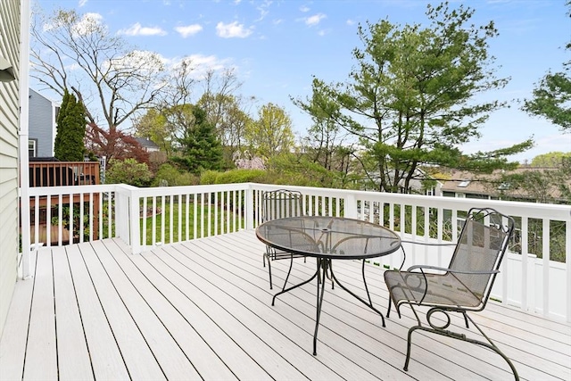 31 Wight St, Waltham, MA 02452 - wooden deck with outdoor dining space