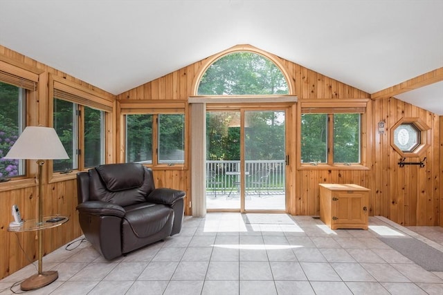 221 Andrew Ln, Hanson, MA 02341 - sunroom / solarium featuring vaulted ceiling, wooden walls, and tile patterned flooring