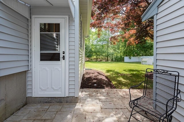 221 Andrew Ln, Hanson, MA 02341 - entrance to property with a lawn and a patio area
