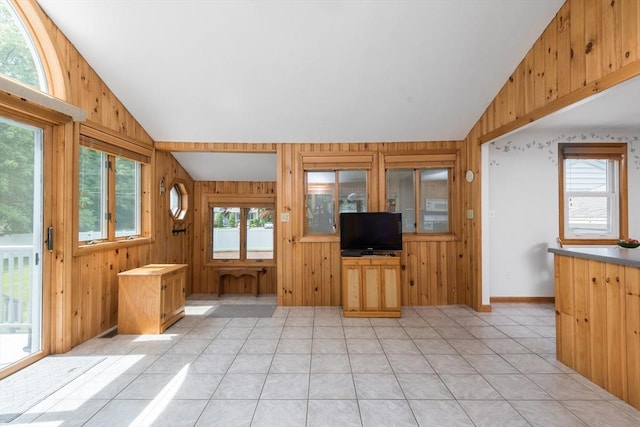 221 Andrew Ln, Hanson, MA 02341 - unfurnished living room with lofted ceiling and wood walls