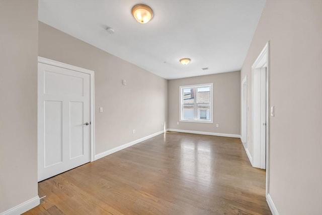 966 Hyde Park Ave Unit 301, Boston, MA 02136 - empty room featuring wood finished floors and baseboards