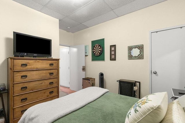 bedroom with a drop ceiling