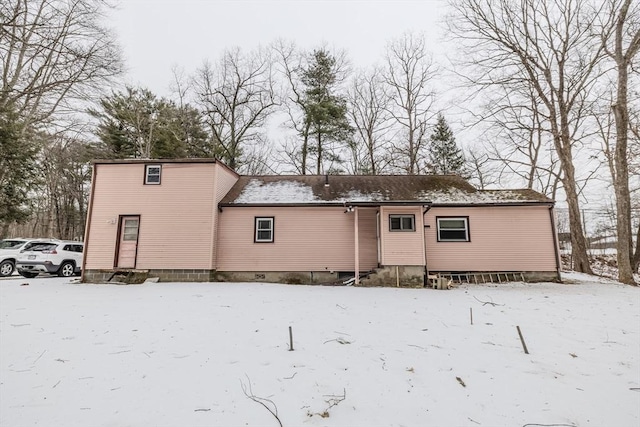 view of snow covered property