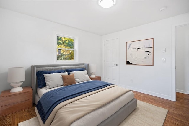 bedroom featuring wood-type flooring