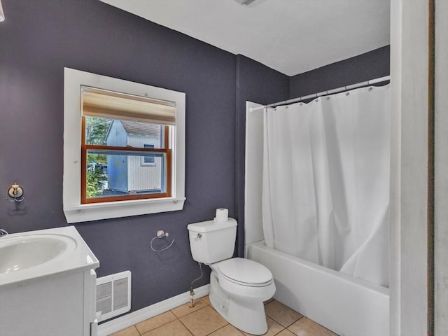 full bathroom featuring tile patterned flooring, vanity, toilet, baseboards, and visible vents