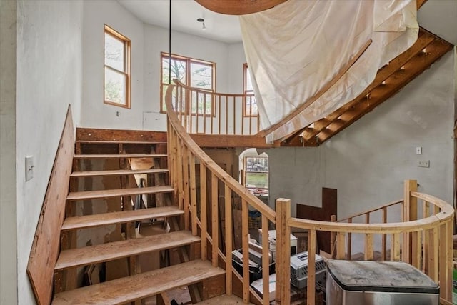 stairway with a high ceiling
