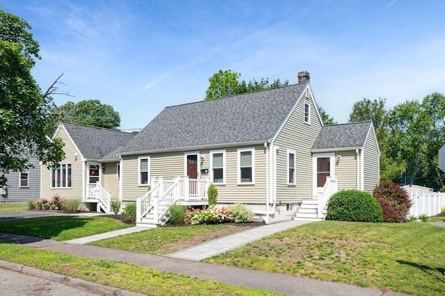 11 Beaver Park, Danvers, MA 01923 - cape cod-style house featuring a chimney, a shingled roof, and a front lawn