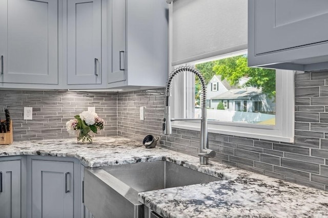 11 Beaver Park, Danvers, MA 01923 - kitchen with decorative backsplash and light stone counters