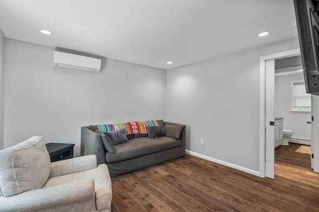 11 Beaver Park, Danvers, MA 01923 - living room with a wall mounted air conditioner, baseboard heating, wood finished floors, and recessed lighting