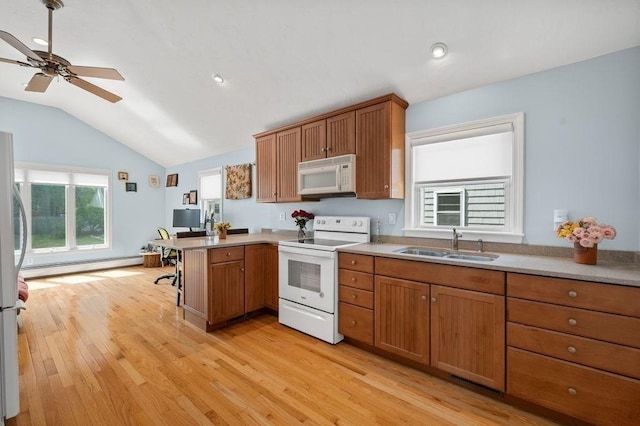 11 Beaver Park, Danvers, MA 01923 - kitchen with white appliances, a peninsula, a baseboard heating unit, vaulted ceiling, and ceiling fan