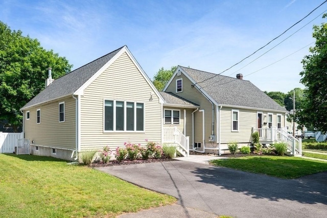 11 Beaver Park, Danvers, MA 01923 - view of front of home with a front yard and a shingled roof