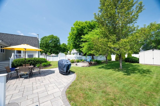 11 Beaver Park, Danvers, MA 01923 - view of yard featuring a patio, a storage unit, and outdoor dining area