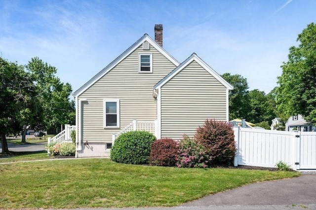 11 Beaver Park, Danvers, MA 01923 - view of side of home with a chimney