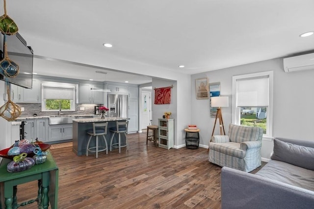 11 Beaver Park, Danvers, MA 01923 - living area with a wall mounted air conditioner, recessed lighting, and dark wood-style floors