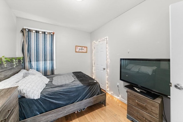 bedroom featuring hardwood / wood-style flooring