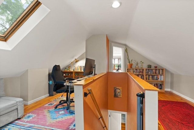 61 Fiske Ave, Waltham, MA 02453 - office space featuring light wood-style floors, vaulted ceiling, and a skylight