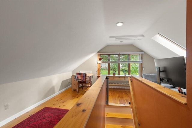 61 Fiske Ave, Waltham, MA 02453 - additional living space featuring wood finished floors and vaulted ceiling