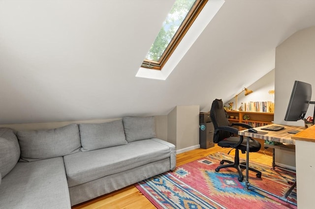 61 Fiske Ave, Waltham, MA 02453 - office with wood finished floors, a skylight, and vaulted ceiling