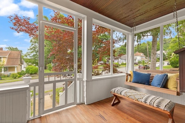 61 Fiske Ave, Waltham, MA 02453 - sunroom featuring a residential view