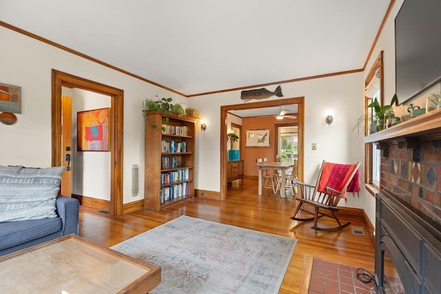 61 Fiske Ave, Waltham, MA 02453 - sitting room with wood finished floors and ornamental molding