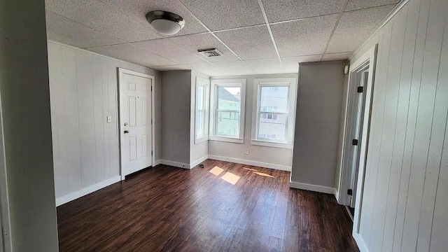 274 Harrison St, Fall River, MA 02723 - entryway with dark wood-style flooring and wood walls