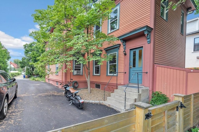17 Teel St Unit 1, Arlington, MA 02474 - view of front of house featuring a fenced front yard and a gate