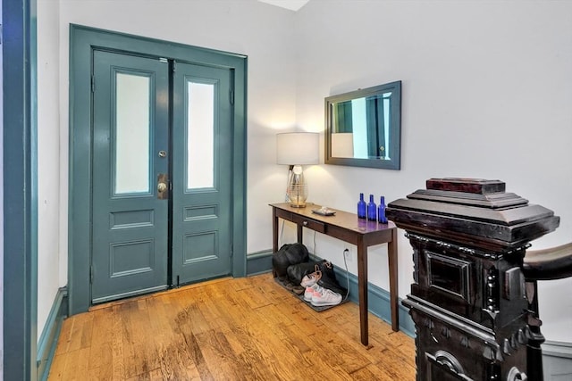17 Teel St Unit 1, Arlington, MA 02474 - foyer entrance featuring wood finished floors and baseboards
