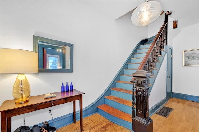 17 Teel St Unit 1, Arlington, MA 02474 - stairway with wood finished floors