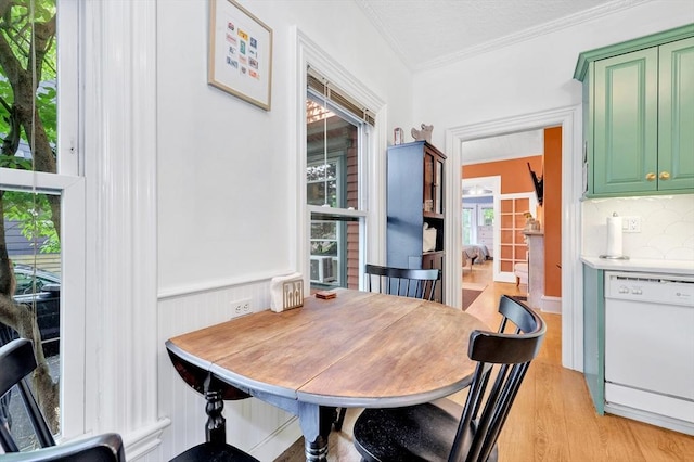 17 Teel St Unit 1, Arlington, MA 02474 - dining area with light wood finished floors and ornamental molding