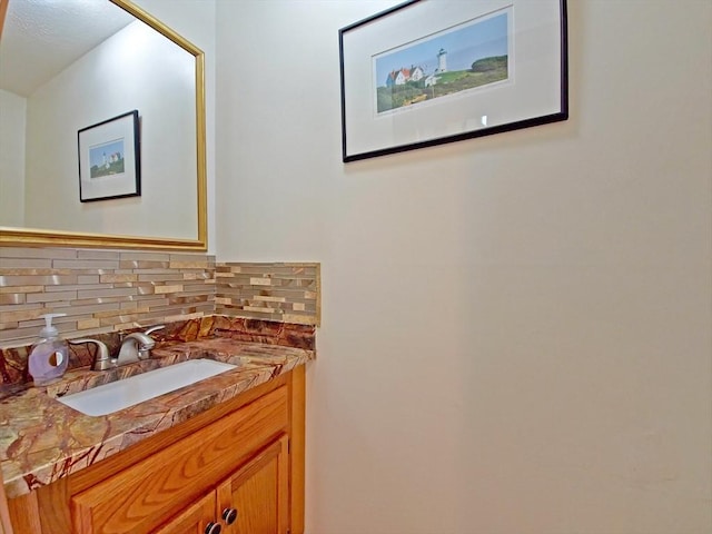30 Norris Path, Falmouth, MA 02536 - bathroom with tasteful backsplash and vanity