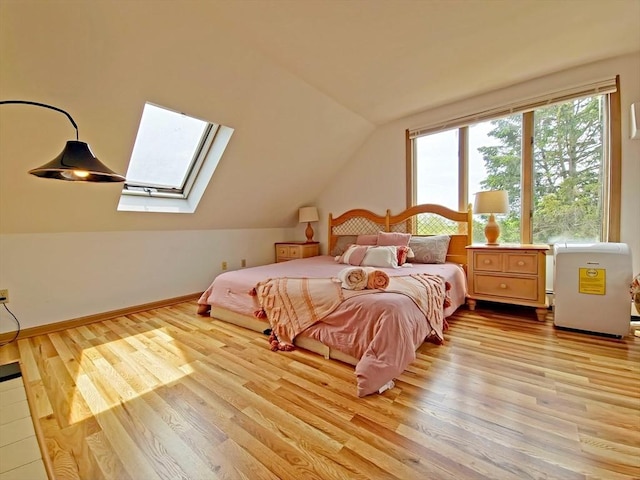 30 Norris Path, Falmouth, MA 02536 - bedroom featuring vaulted ceiling, a skylight, and light wood finished floors