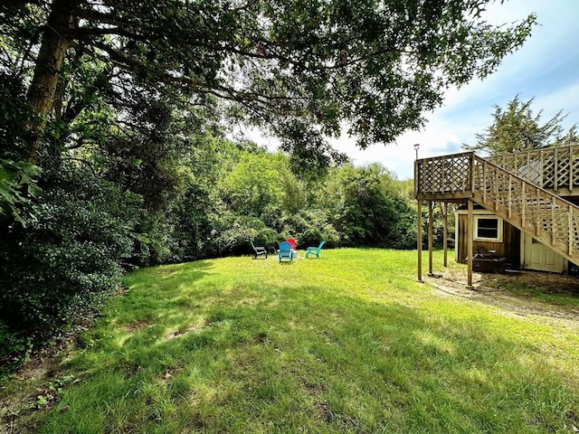 30 Norris Path, Falmouth, MA 02536 - view of grassy yard with a wooden deck and stairway