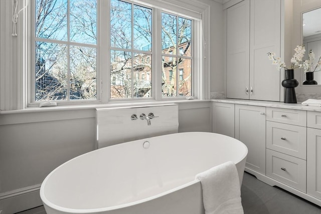 bathroom featuring a tub to relax in