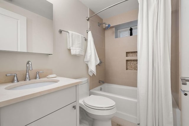 full bathroom with vanity, shower / bath combination with curtain, and toilet