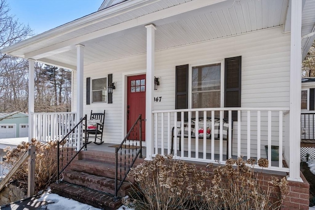 property entrance with covered porch