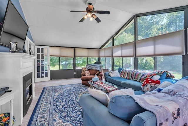 33 Dean St, Norton, MA 02766 - living room with ceiling fan, a glass covered fireplace, and high vaulted ceiling