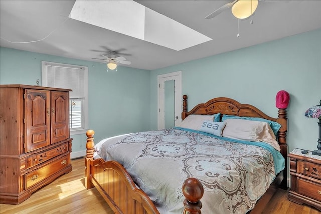 33 Dean St, Norton, MA 02766 - bedroom with a skylight, light wood-style flooring, and ceiling fan